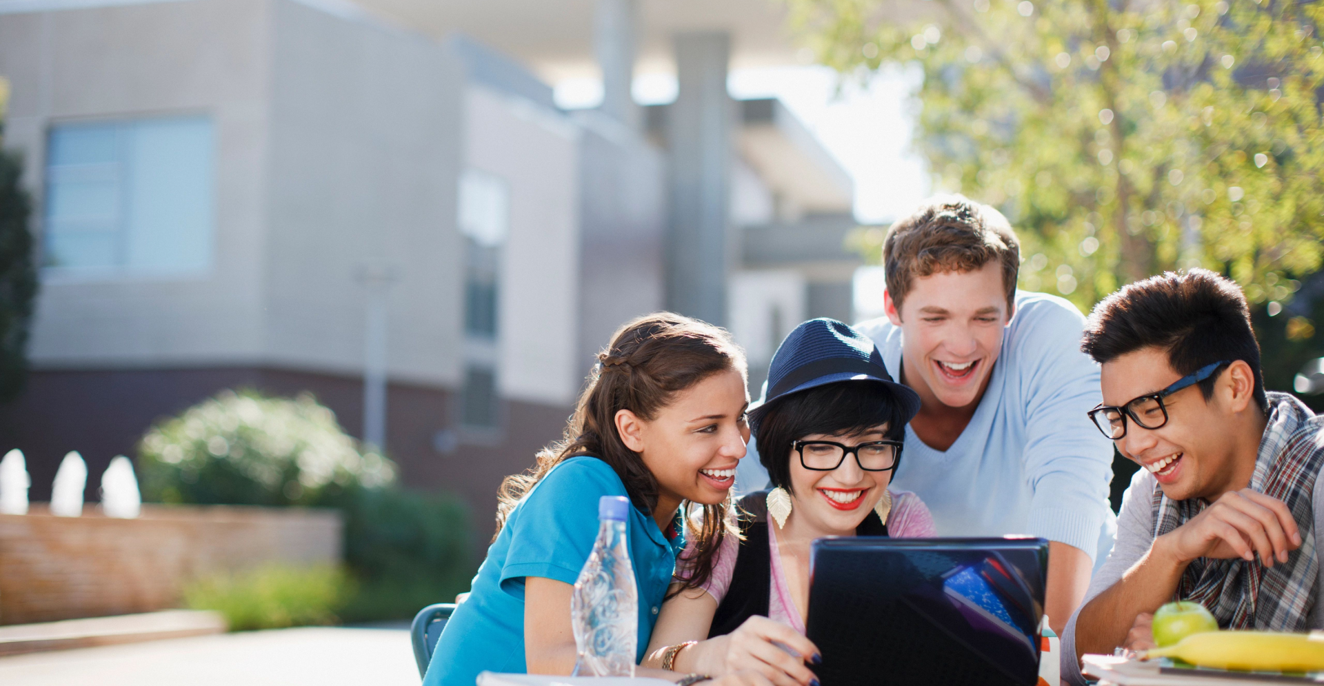 A group of diverse people enjoyed collaborating with each other.