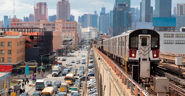 Subway Train Approaching  Elevated Subway Station in Queens, New York