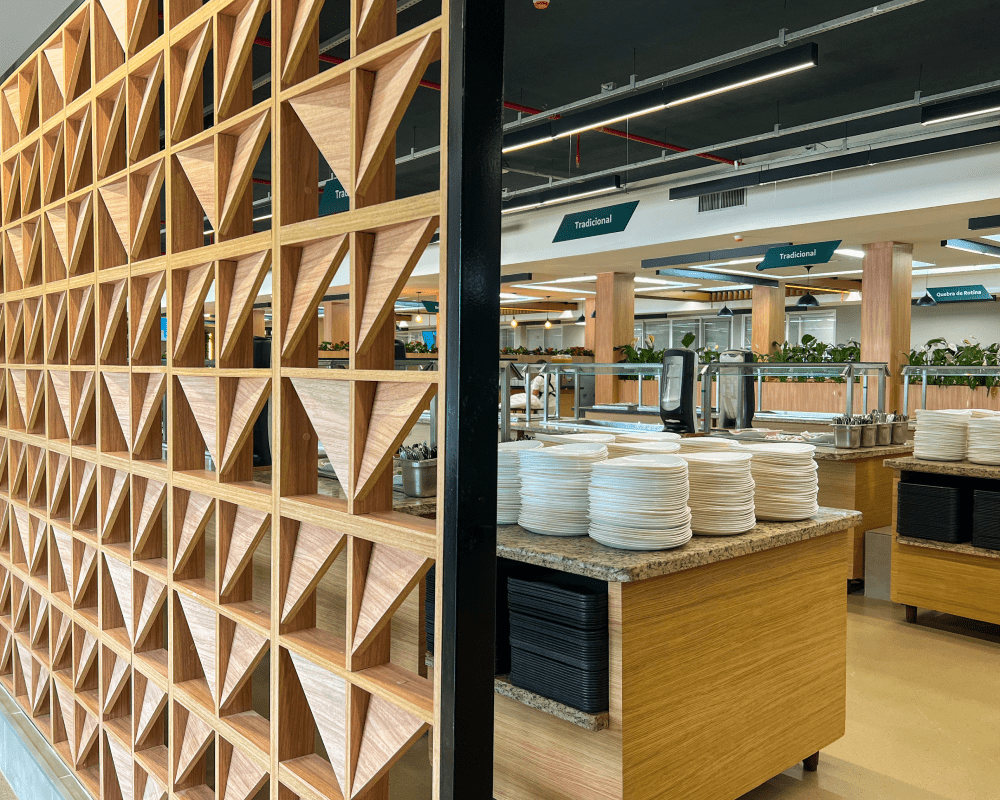 Rustic restaurant ambiance with wooden panels and a counter.