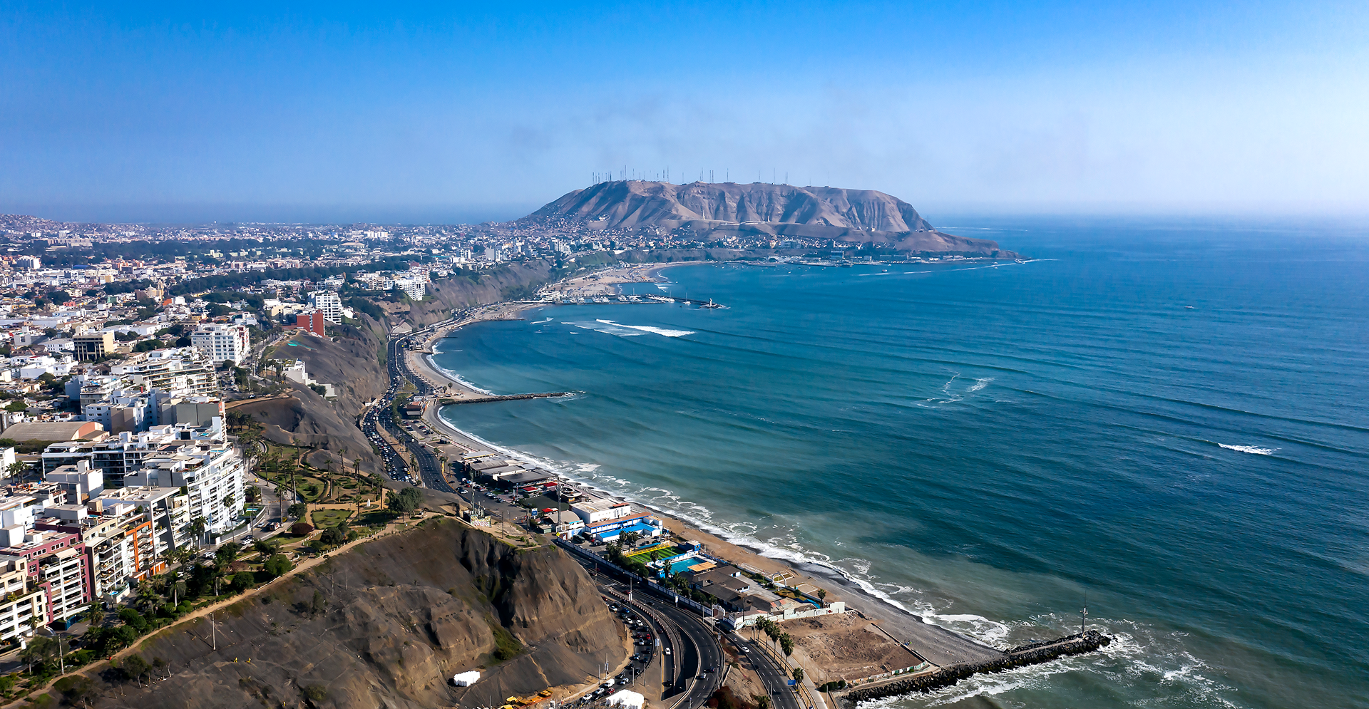 Panoramic view of San Juan, showcasing the vibrant cityscape of Guayaquil, Ecuador under a clear blue sky.