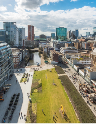 Aerial view of Amsterdam, capital of the Netherlands, showcasing its iconic canals and historic architecture.